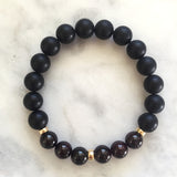 Men's black onyx and red garnet beaded energy bracelet for vata dosha with gold beads