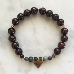 Red garnet and cat's eye pregnancy yoga jewelry bracelet with gold triangle charm