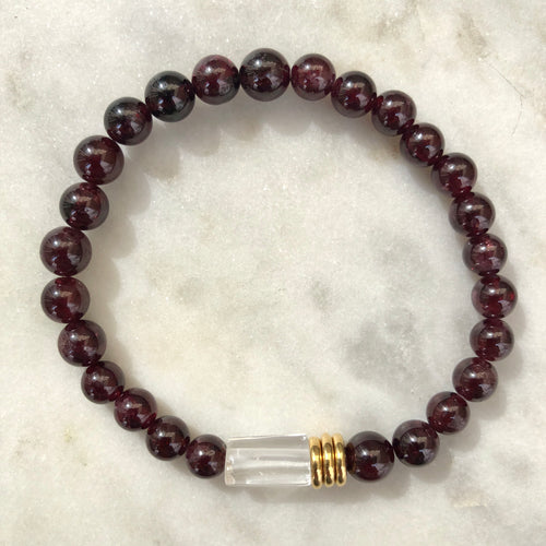 bracelet with 6mm red garnet stones, clear quartz nugget and gold accents