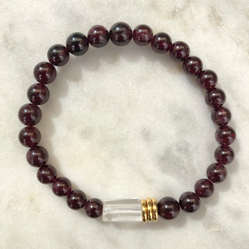 bracelet with 6mm red garnet stones, clear quartz nugget and gold accents