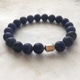 Men's blue lapis lazuli beaded energy bracelet with gold hexagon bead