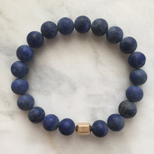 Men's blue lapis lazuli beaded energy bracelet with gold hexagon bead