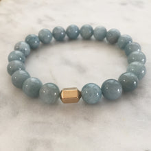 Men's light blue aquamarine beaded energy bracelet with gold hexagon bead