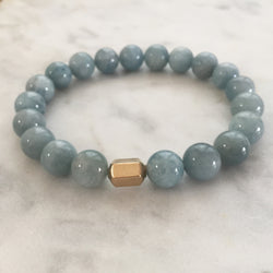 Men's light blue aquamarine beaded energy bracelet with gold hexagon bead