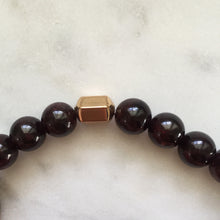 Men's red garnet beaded energy bracelet with gold hexagon bead