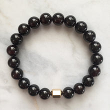 Men's red garnet beaded energy bracelet with gold hexagon bead