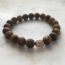 Men's matte golden tiger's eye beaded energy fertility bracelet with gold hexagon bead