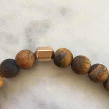 Men's matte golden tiger's eye beaded energy fertility bracelet with gold hexagon bead