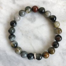 men's cat's eye beaded energy bracelet with sterling silver bead