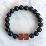 Men's red carnelian and matte black onyx beaded fertility energy bracelet with gold accents