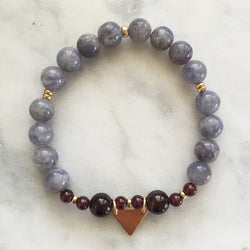 Purple iolite and red garnet kapha beaded bracelet with gold triangle charm